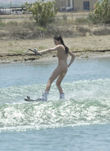 Nudist surfer