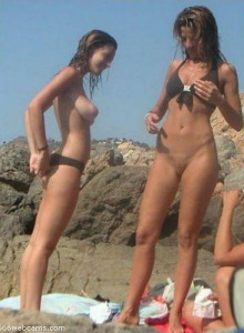 Exciting young nudists on the beach