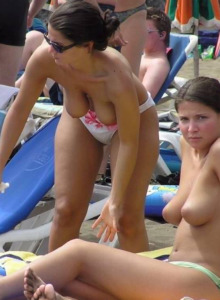 Exciting topless candid girlfriends on the beach