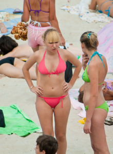 Exciting candid girls getting tan on beach