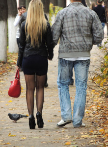 Beautiful candid girl in skirt and pantyhose