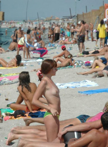 Beach full of topless nudists