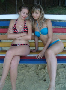 Real girl in blue bikini on the beach