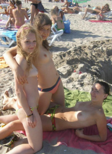 Topless teen gf in white bikini at the beach