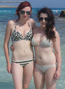 Hot topless girls Lauren and Alice in the sea in black sunglasses and bikinis