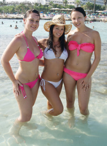 Beautiful Rachel with her girlfriends in the sea in pink and white bikinis