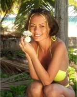 Hot Crissy Moran poses in tiny yellow bikini