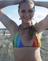 Beautiful fairy Josie is by the river wearing rainbow bikini