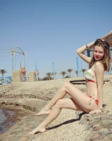 Two teen gf's in see-through bikini