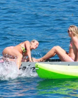 Exciting candid blonde ass in pink micro bikini