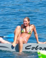 Exciting candid blonde ass in pink micro bikini