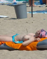 Topless puffy nipples redhead gf Susy is in bikini on the beach