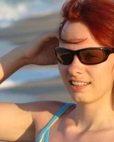 Topless puffy nipples redhead gf Susy is in bikini on the beach