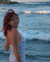 Topless puffy nipples redhead gf Susy is in bikini on the beach