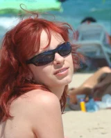 Topless puffy nipples redhead gf Susy is in bikini on the beach