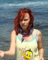 Topless puffy nipples redhead gf Susy is in bikini on the beach