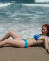 Topless puffy nipples redhead gf Susy is in bikini on the beach